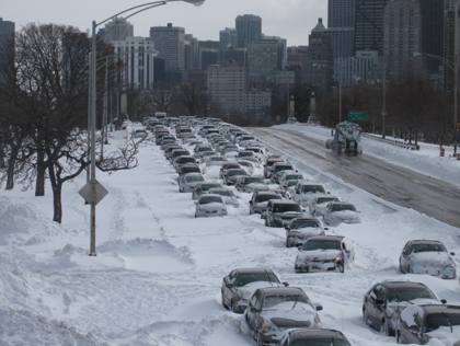 Cars are buried in snow on Lake Shore Drive after the Blizzard of 2011. (Credit: "Rock"/User Photo)
