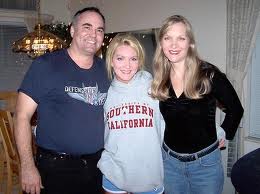 A photo of Christina Eilman with her parents before she was attacked and nearly killed in Chicago. (Family Photo)