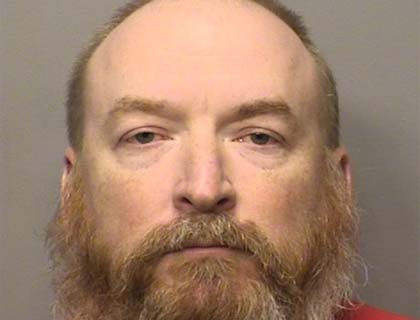 Bryan Tyman, 44, is accused of sending a sexually explicit photo to a teen. (Porter County Sheriff's Dept.)