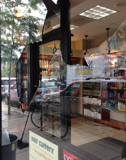 Windows were smashed at the Hair Cuttery in Lincoln Park. (Credit: Steve Miller)