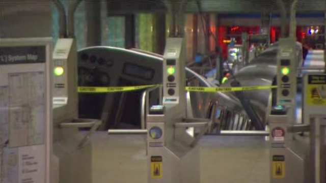 A Blue Line train ended up on the escalator at the O'Hare terminal early Monday, after it failed to stop and derailed. (Credit: CBS)