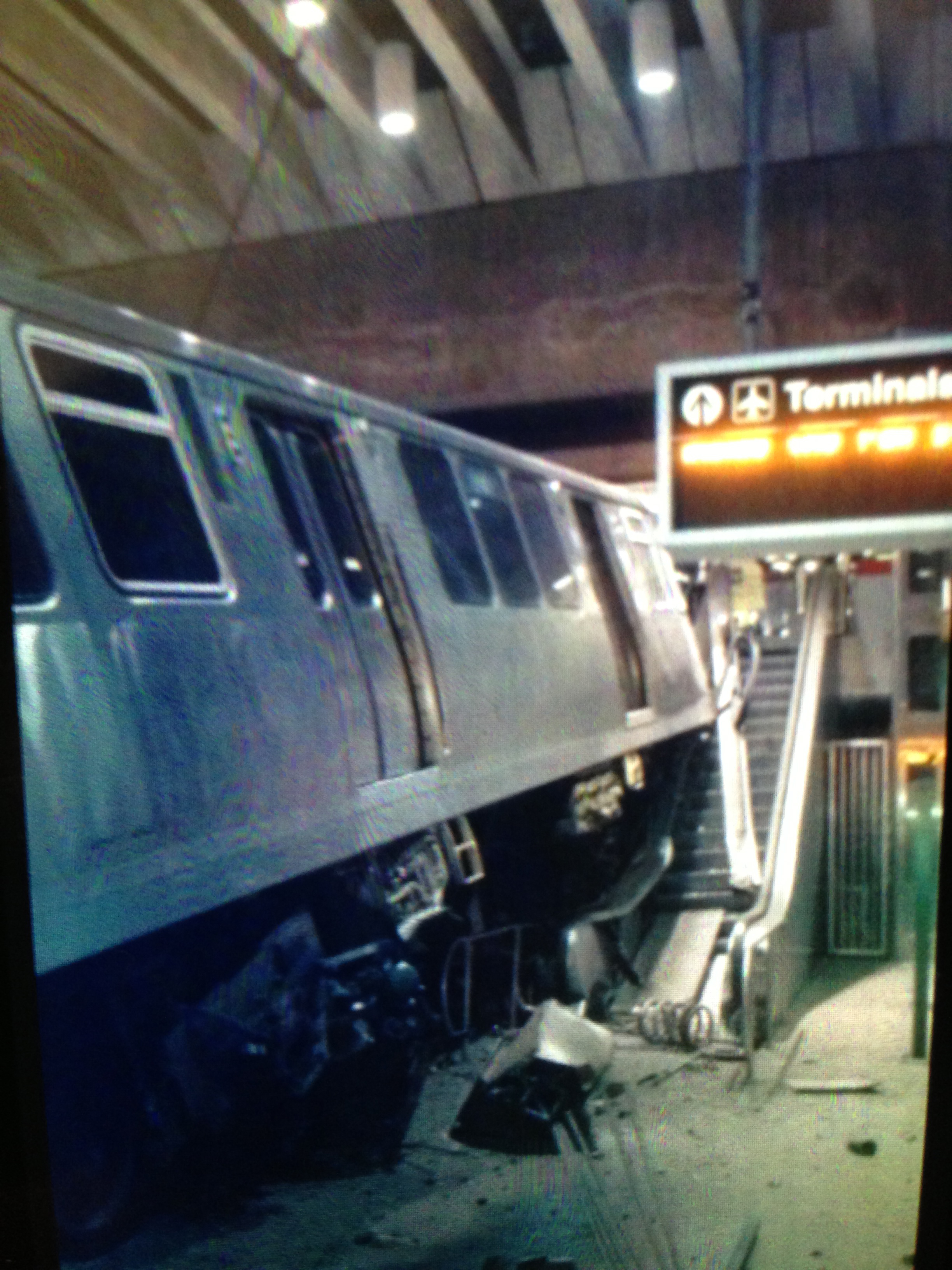 A CTA Blue Line train ended up on the escalator at the O'Hare station early Monday, after it failed to stop. (Photo supplied to CBS 2)