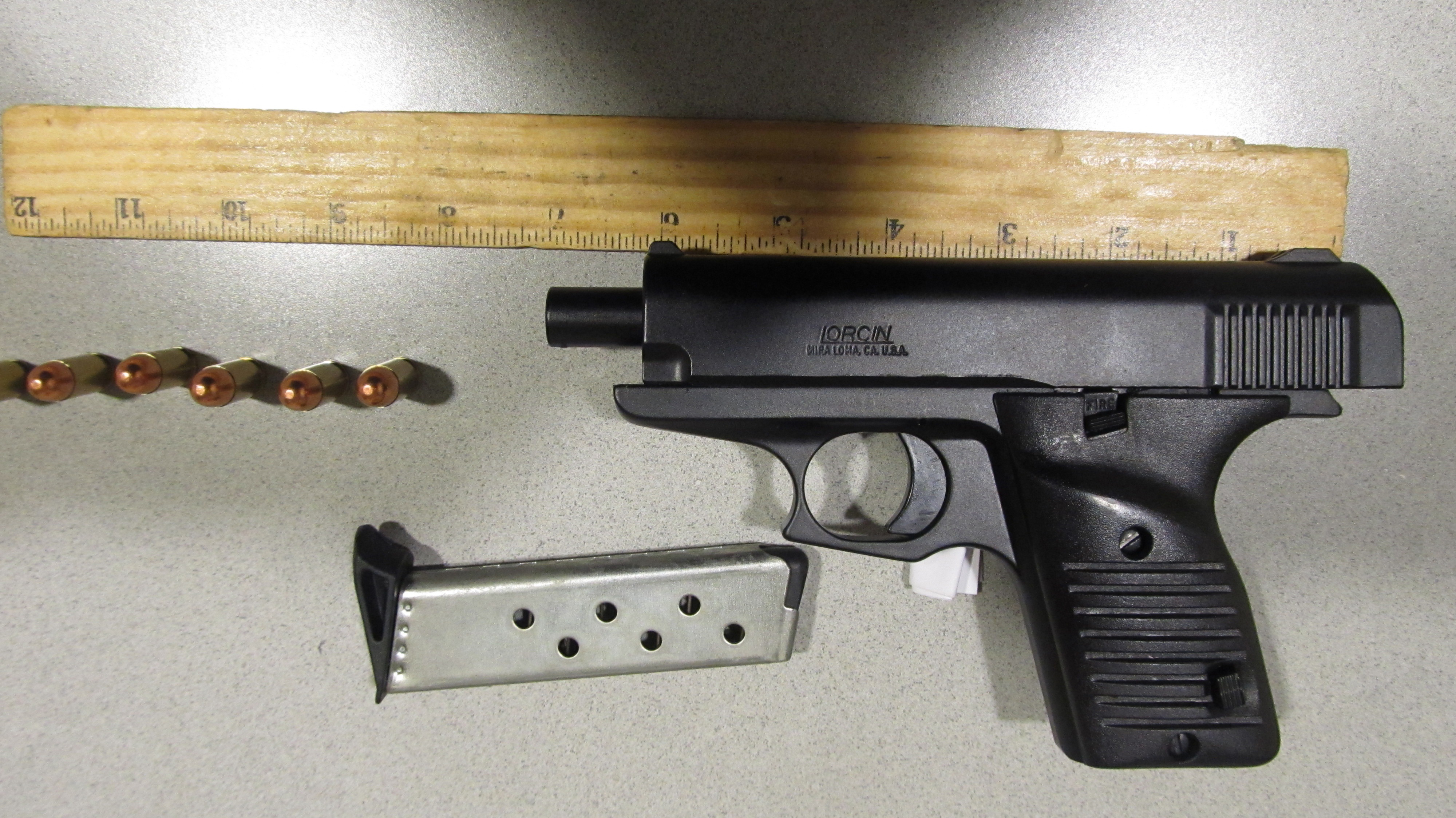 TSA screeners found this Lorcin .380 handgun in the carry-on bag of a 62-year-old man going through security at Midway International Airport. (Credit: TSA)