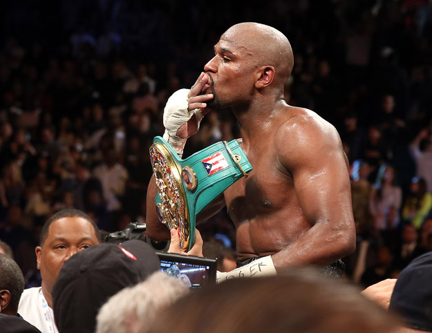 World Boxing Council champion Floyd Mayweather celebrates after beating and Robert Guerrero.