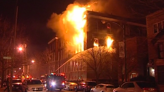 Firefighters battle a fire at a building in Lincoln Park. (Credit: Network Video Productions)