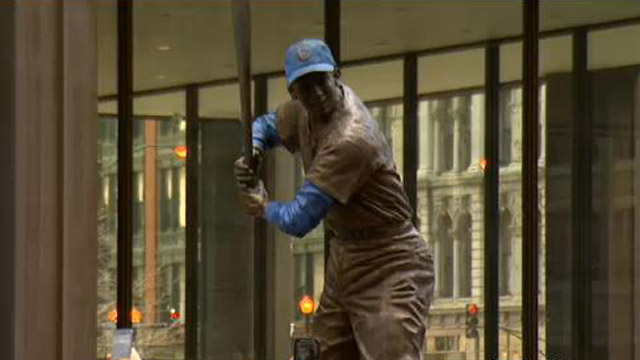 A 7-foot bronze statue of Ernie Banks was moved to Daley Plaza on Wednesday, and will stay there through Saturday, as a public memorial after his death at the age of 83. (Credit: CBS)
