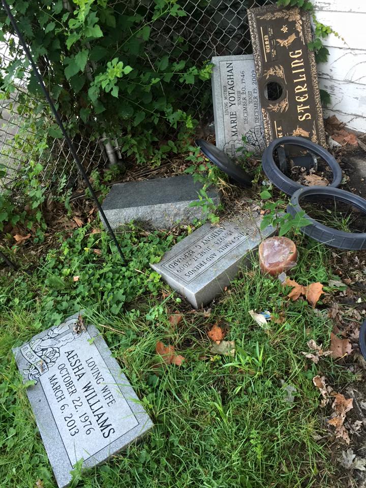 Headstones found outside the garage where police discovered three bodies and other remains on Wednesday. (Credit: Bernie Tafoya/WBBM)