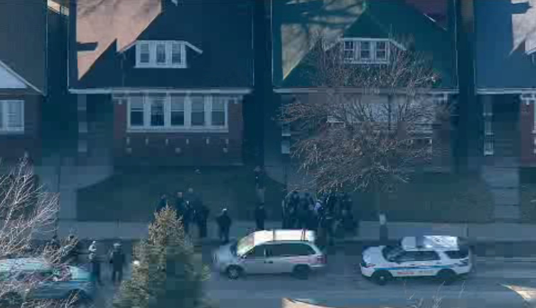 Six people were found dead inside a home in the 5700 block of S. California. (CBS) 